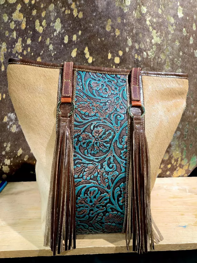 Ref. 714 — Tan hide tote with turquoise tooled floral panel