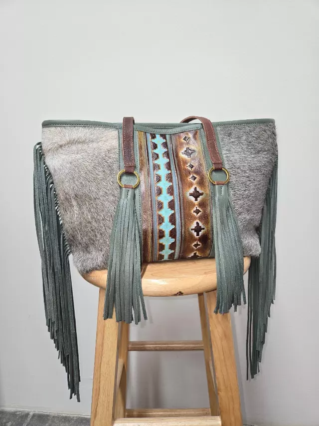 Ref 712 F — Grey hide tote with green leather fringe