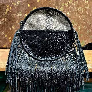 Ref. 777 — Round black fringed crossbody with croc embossed panel