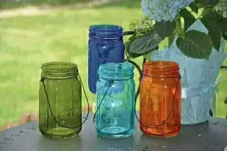 GP5007ASST – 6.5” tall mason jar with metal handle. asst. colors-“CS/16 pcs”