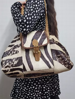 Ref 701 — Striped hair-on hide shoulder bag with buckle flap