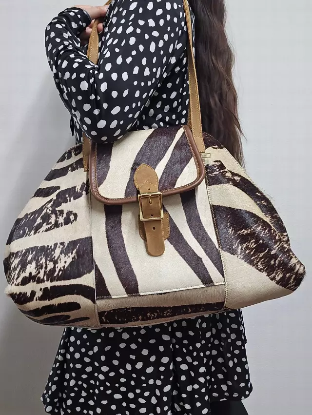 Ref 701 — Striped hair-on hide shoulder bag with buckle flap