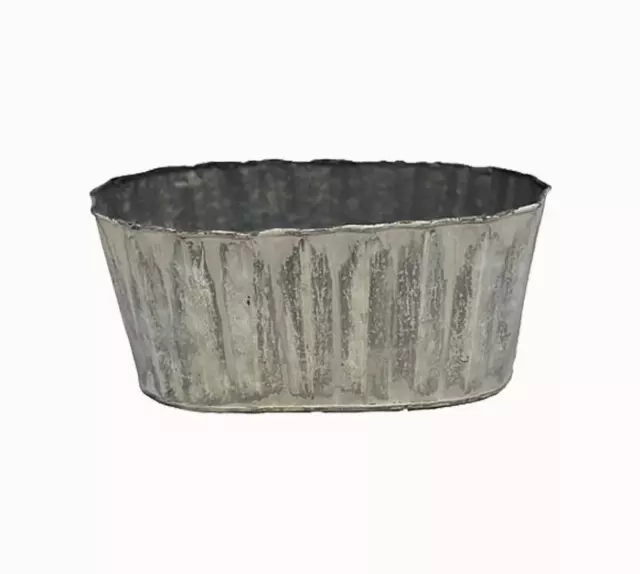 XMT3004-10 – 9.5”oval ribbed WW tin (fits 2-4” pots)-“each” – W/L-Min 12 pcs-Case Pk 48