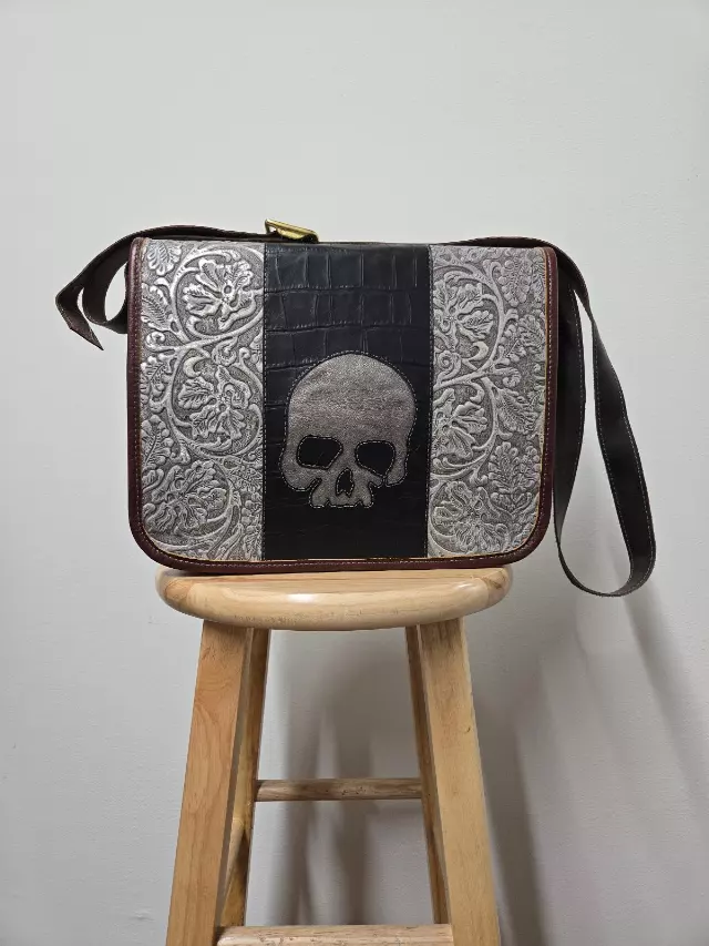Ref. 2118 — Tooled leather messenger bag with skull applique